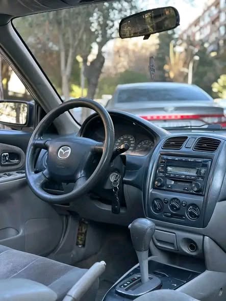 مازدا 323 2005 - صورة 1