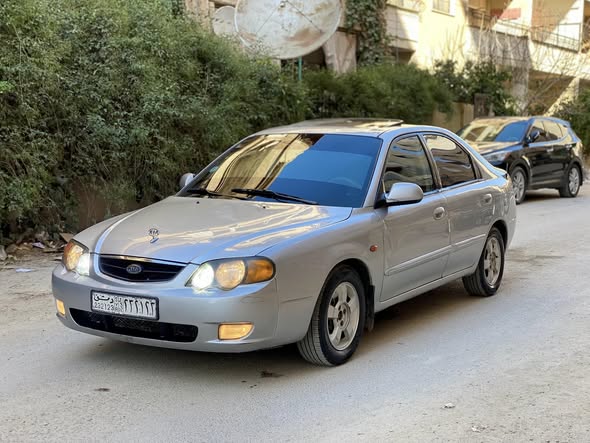 كيا شوما 2001 - صورة 3
