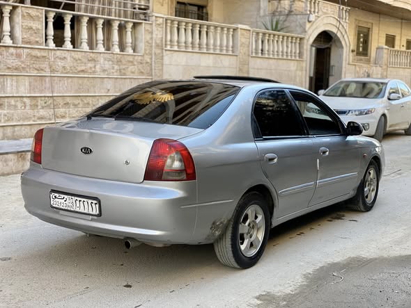 كيا شوما 2001 - صورة 4