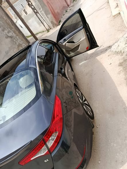 كيا اوبتيما 2013 - صورة 4