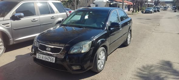 كيا ريو 2010 - صورة 2