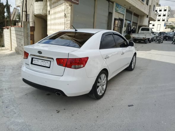 كيا فورتي 2011 - صورة 3