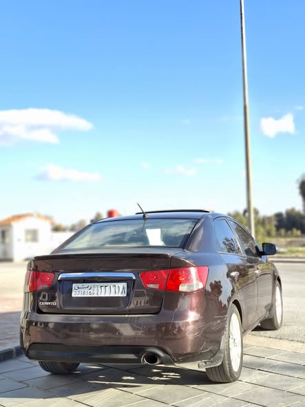 كيا فورتي 2011 - صورة 3