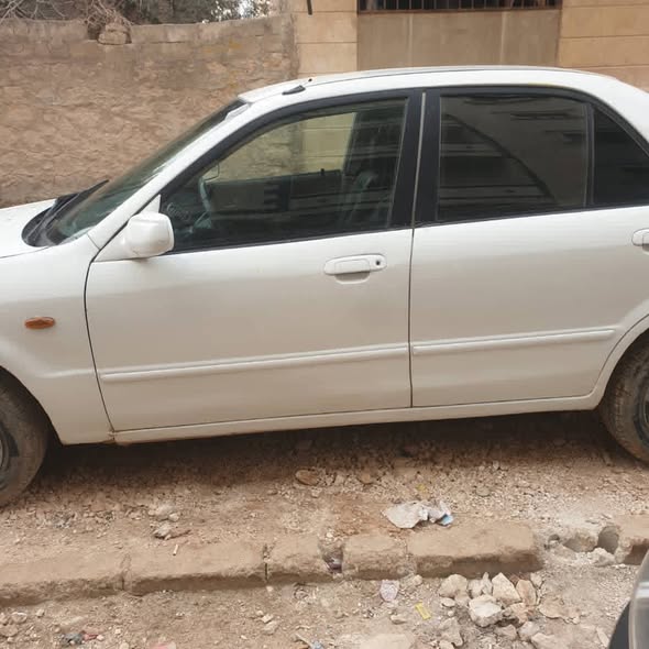 مازدا Familia 2002 - صورة 2