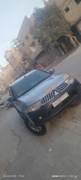 ميتسوبيشي L200 2013 - صورة 2