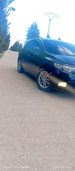 كيا فورتي 2011 - صورة 1