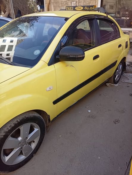 كيا ريو 2011 - صورة 4