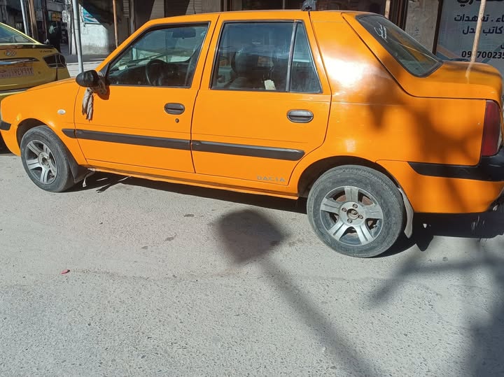 داسيا سولنزا 2003 - صورة 1