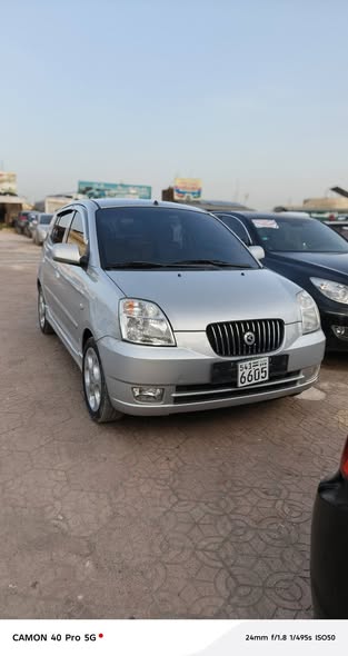 كيا مورنك 2005 - صورة 1