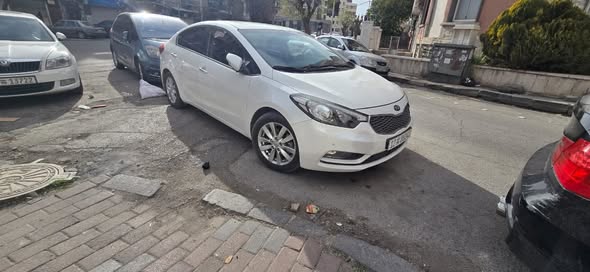 كيا سيراتو 2013 - صورة 2