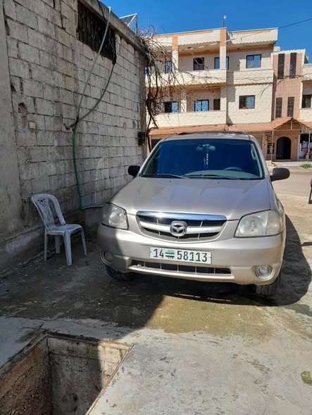 مازدا تريبيوت 2003 - صورة 2