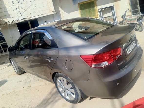 كيا فورتي 2011 - صورة 4