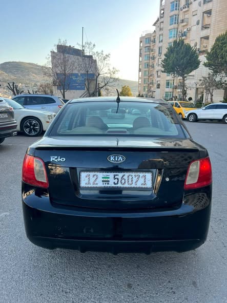كيا ريو كرتا 2010 - صورة 3