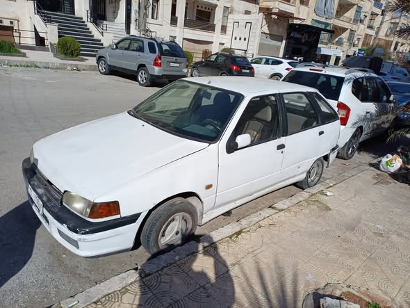 نيسان صني 2004 - صورة 1