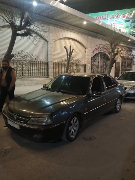 بيجو بارس 2001 - صورة 4