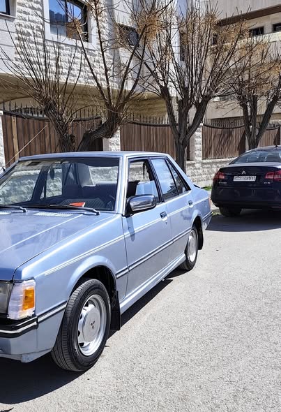 Mitsubishi لانسر 1983 - صورة 2