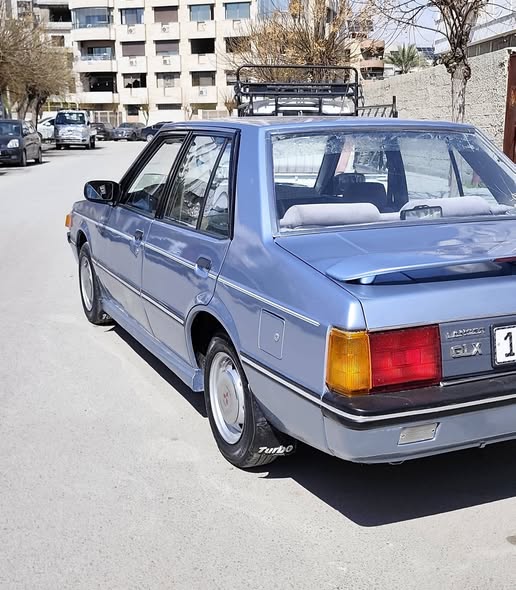 Mitsubishi لانسر 1983 - صورة 5