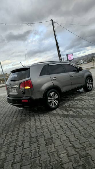 كيا سيرنتو 2010 - صورة 3