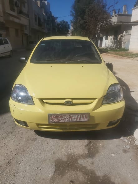 كيا بطة 2001 - صورة 1