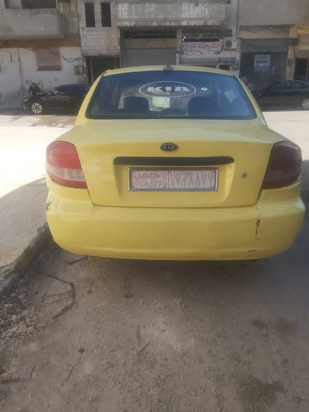 كيا بطة 2001 - صورة 2