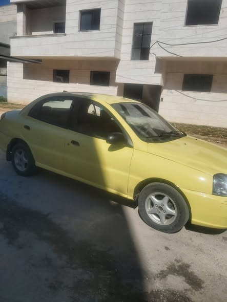 كيا بطة 2001 - صورة 4