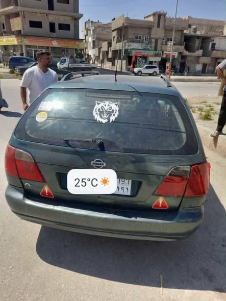 نيسان بريسميرا 2002 - صورة 2