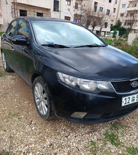 كيا فورتي 2011 - صورة 1