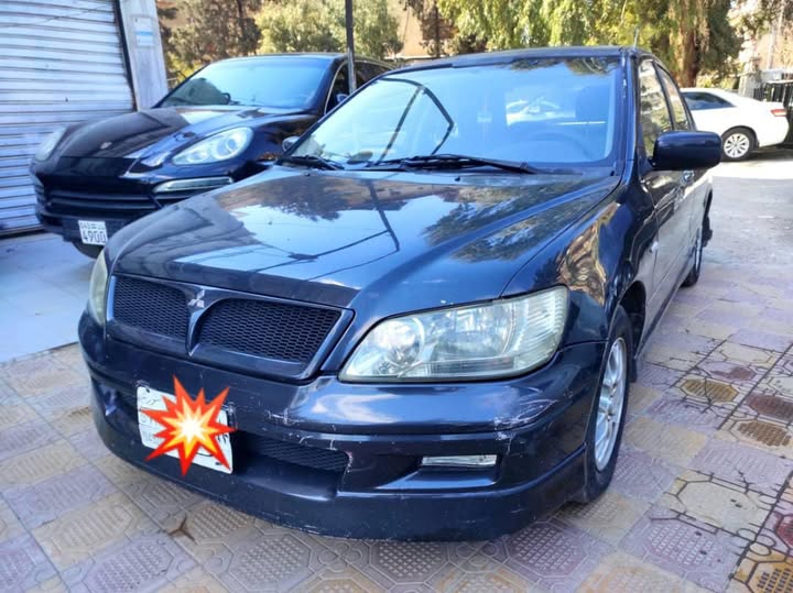 Mitsubishi لانسر 2003