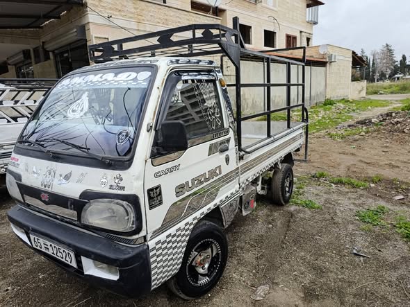 سوزوكي شانجي 2010 - صورة 2