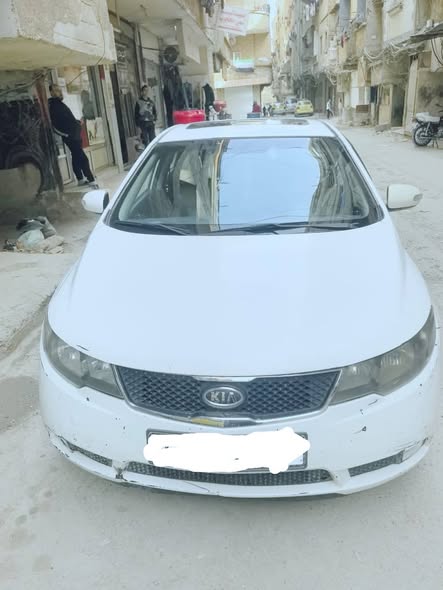 كيا فورتي 2010 - صورة 4