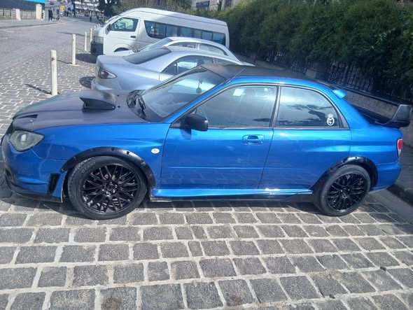 سوبارو امبريزا 2001 - صورة 1