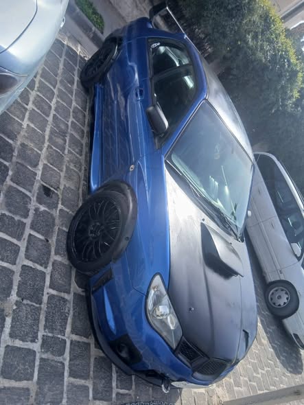 سوبارو امبريزا 2001 - صورة 2