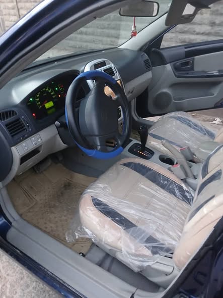 كيا سيراتو 2006 - صورة 5