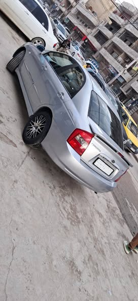 كيا سيراتو 2006 - صورة 5