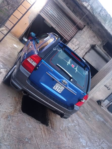 كيا سبورتاج 2006 - صورة 3