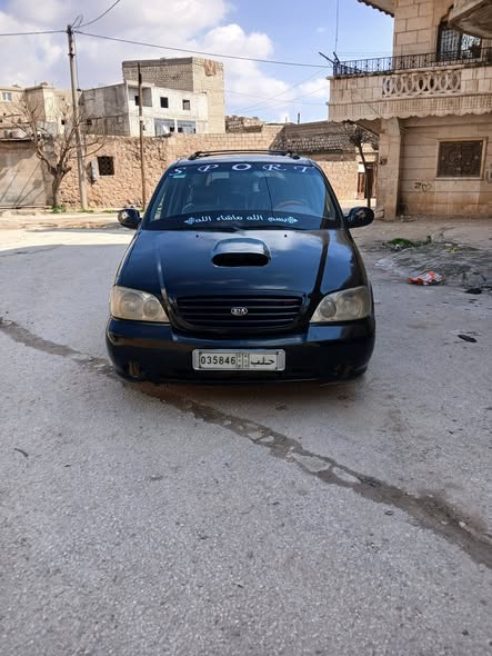 كيا كرنفال 2003 - صورة 1