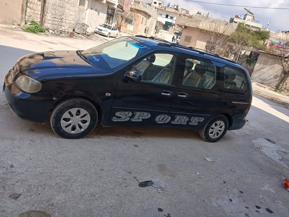 كيا كرنفال 2003 - صورة 4