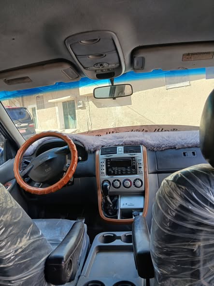 كيا كرنفال 2003 - صورة 5