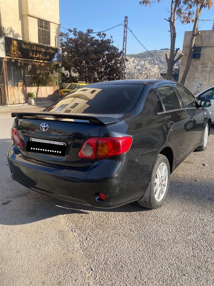 تيوتا كورولا قصة الكامري 2008 - صورة 4