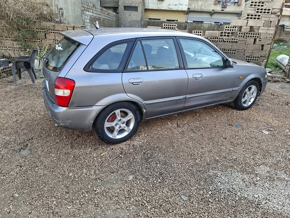 مازدا 323 2004 - صورة 1