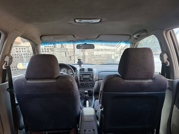 مازدا 323 2004 - صورة 4