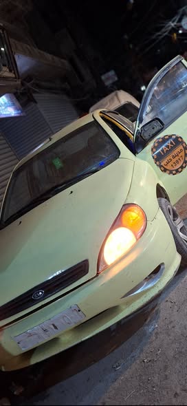 كيا فراشه 2004 - صورة 4