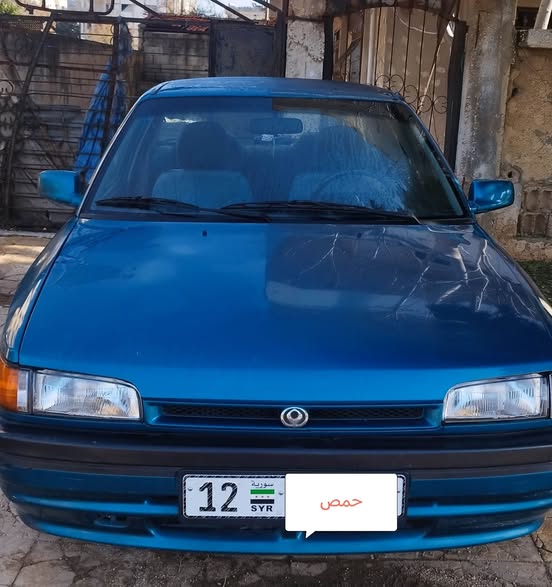 مازدا 323 1993 - صورة 1