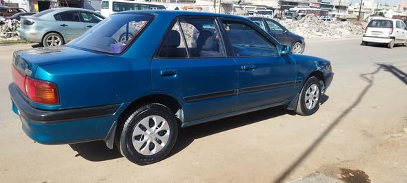 مازدا 323 1993 - صورة 3