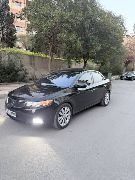 كيا فورتي 2011 - صورة 2