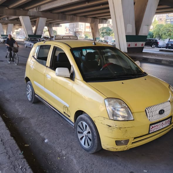 كيا كرت 2003 - صورة 2