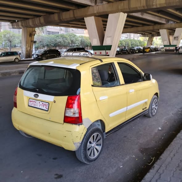 كيا كرت 2003 - صورة 3