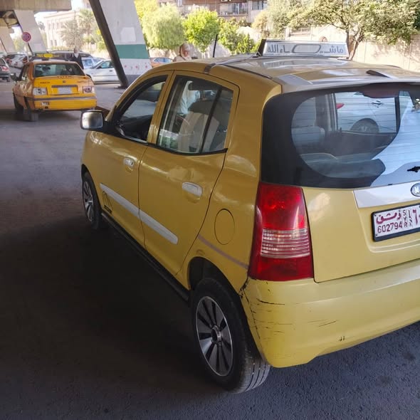 كيا كرت 2003 - صورة 5