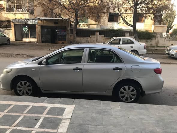 تويوتا كورولا قصة الكامري 2009 - صورة 5