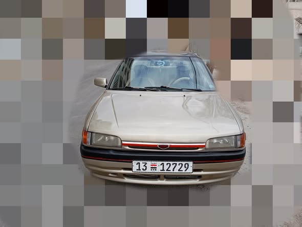 مازدا 323 1993 - صورة 1